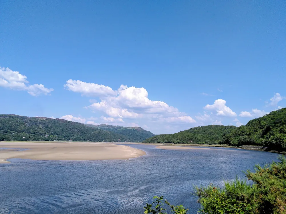 Photo of Mawddach Estuary with blue skies