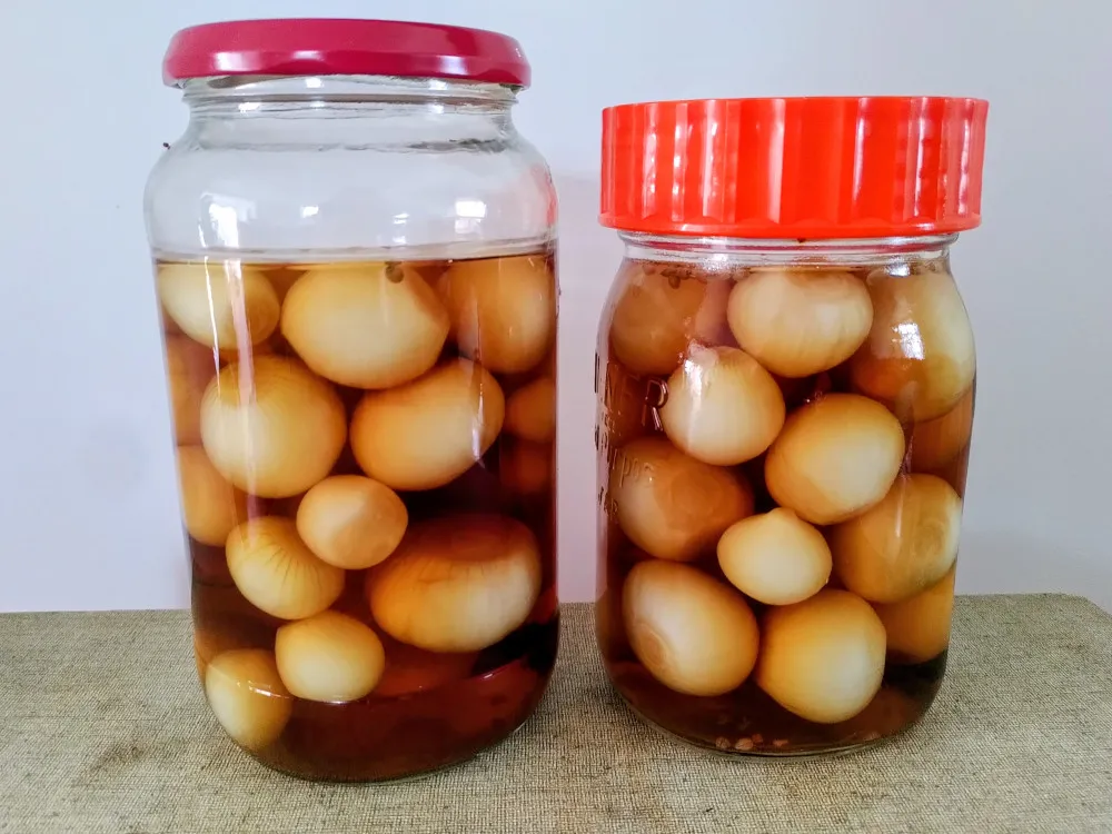 Two jars of pickled onions