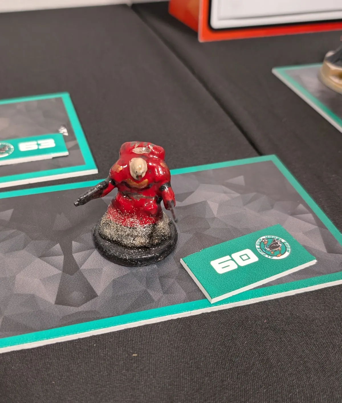 A Space Marine coated with so much paint you can barely make out it's silhouette.
