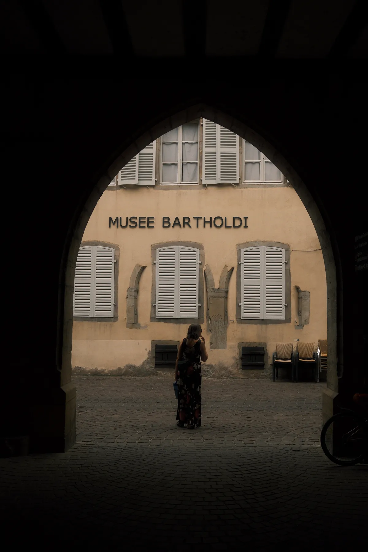 Person looking around in a dark coridor