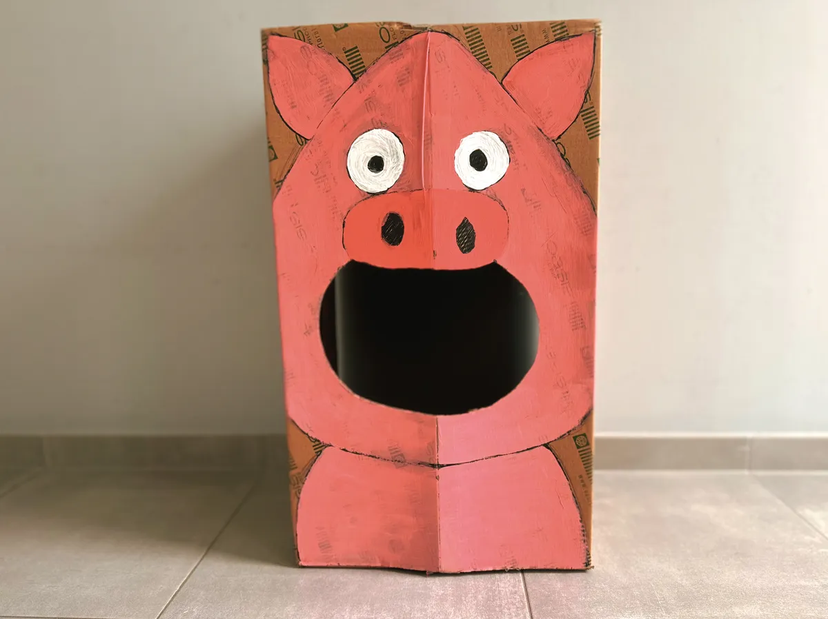 A cardboard pig