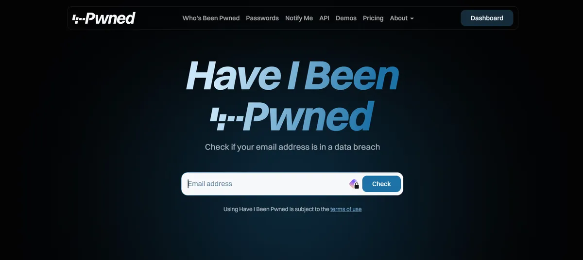 Captura de tela da tela principal do site Have I Been Pwned com destaque para um campo branco escrito "email adress" seguido de um botão azul escrito "check"
