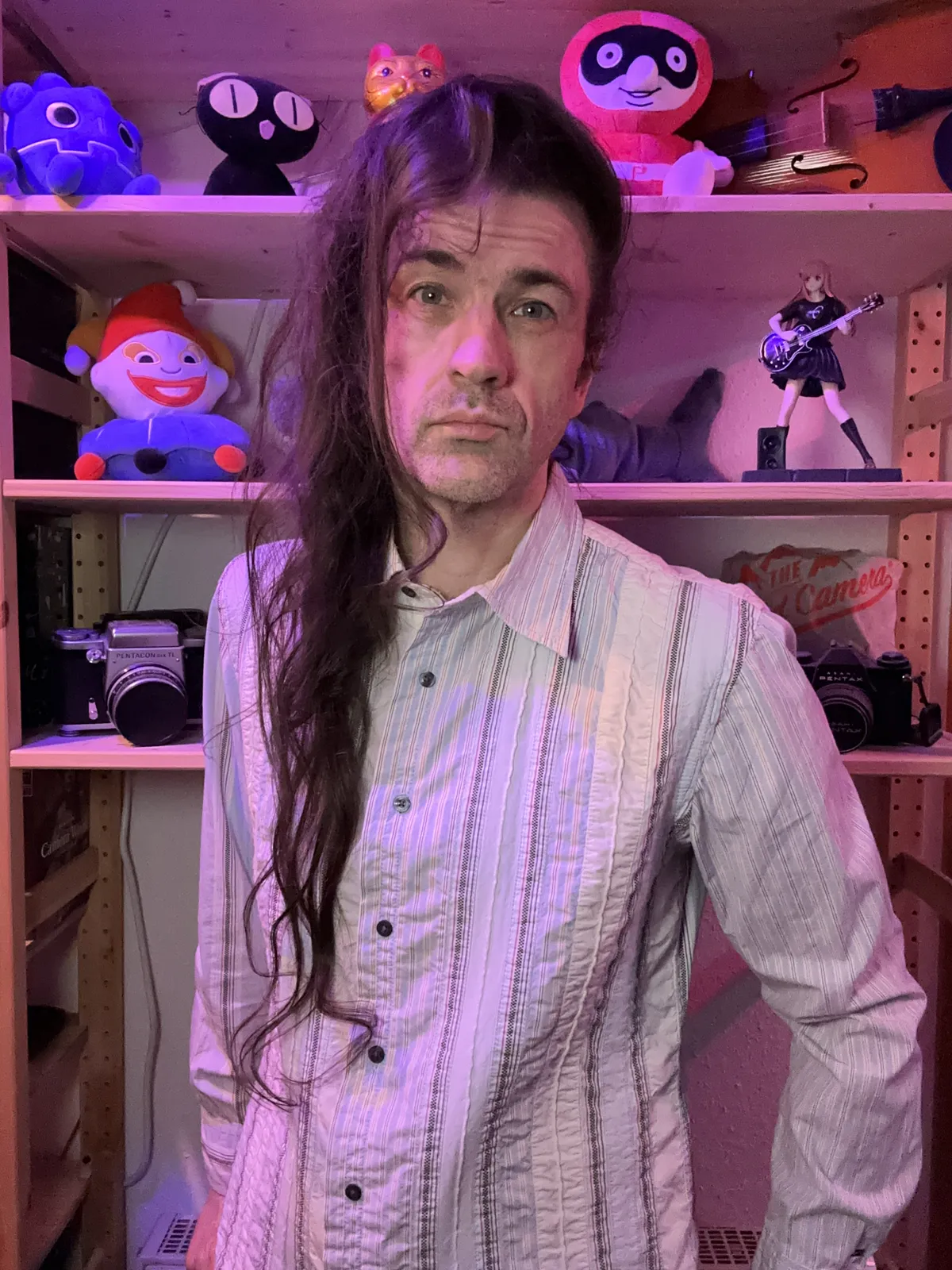 Some middle aged white dude with hair that has been growing for 2002 days