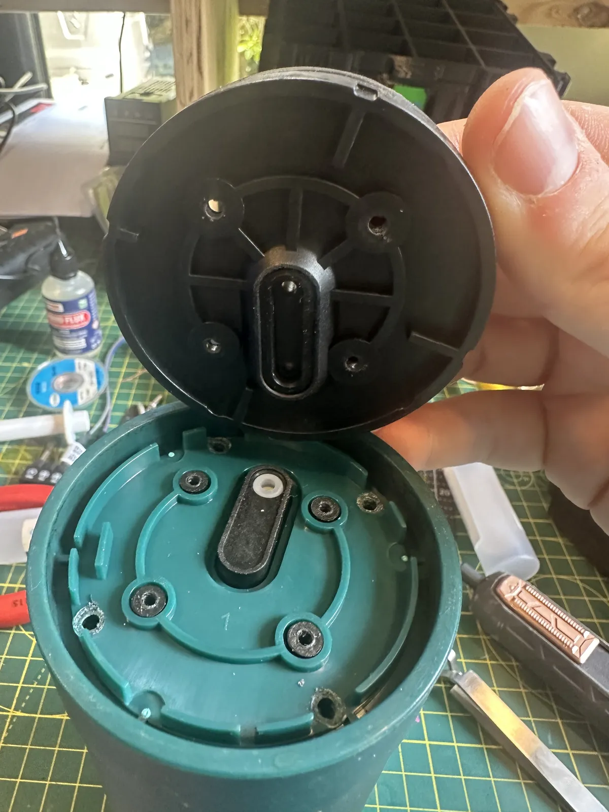 Refitting the top, this time remembering the extra screws
