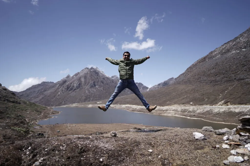 A (visibly) ecstatic me at the Sela Pass, enroute Tawang