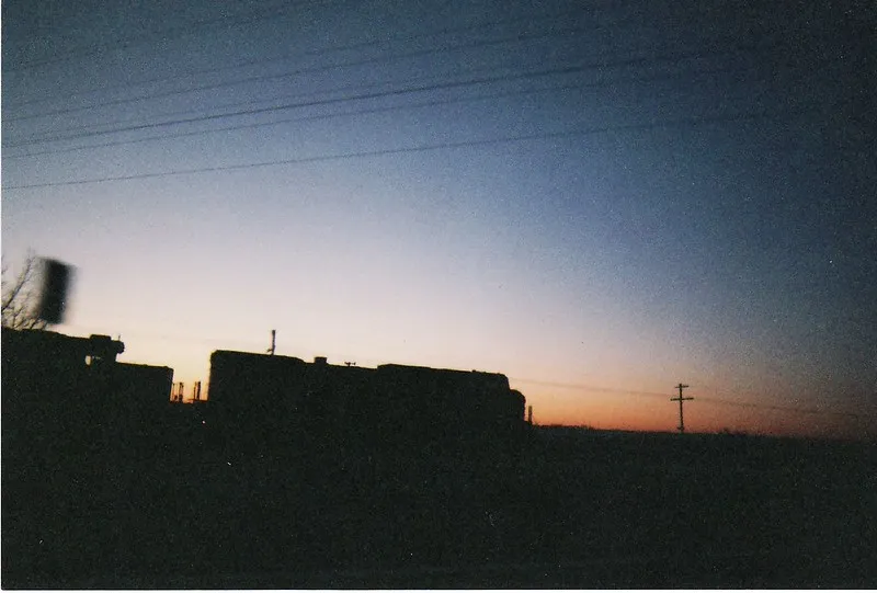 Train at dawn taken on a disposable camera
