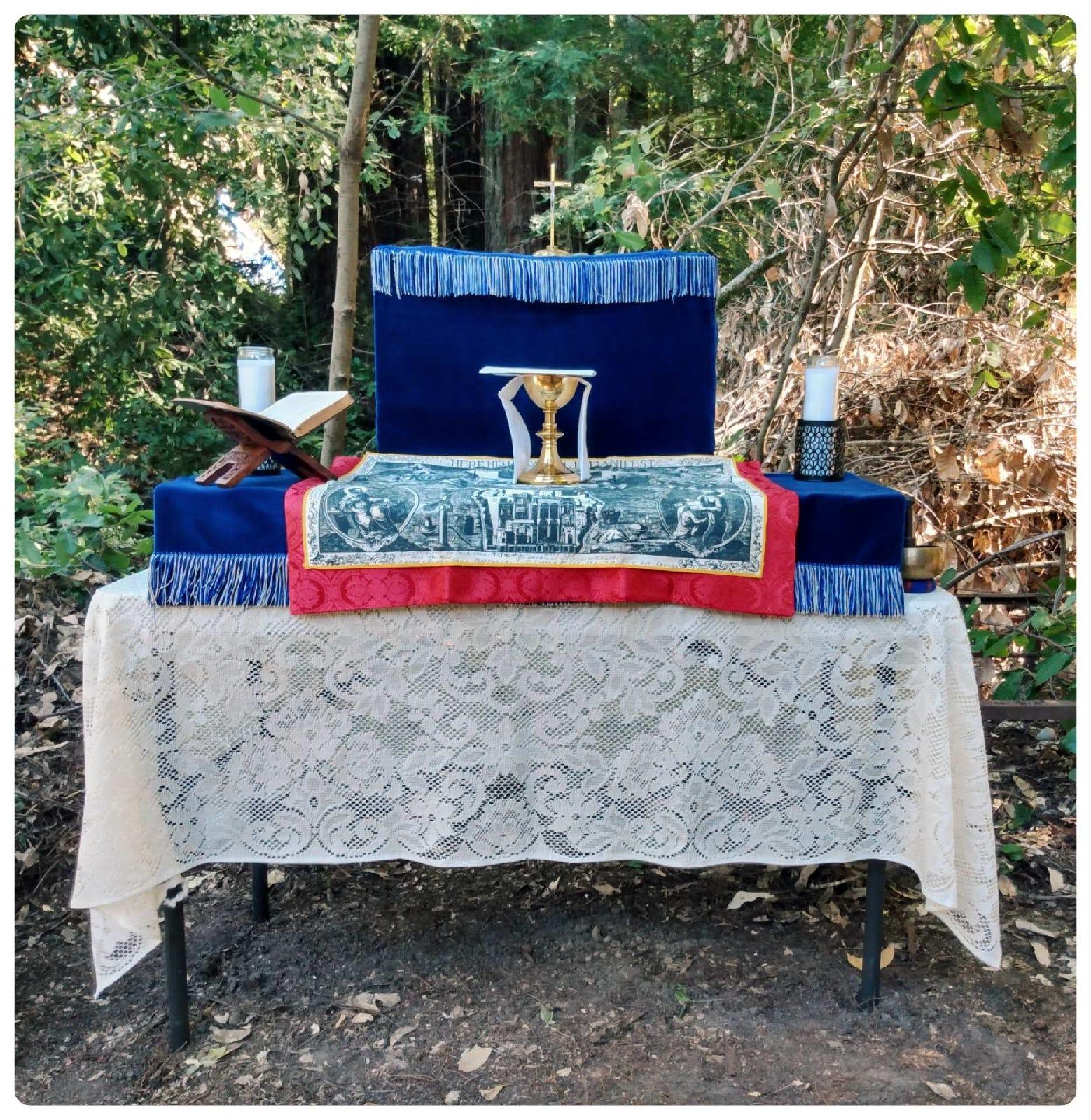 Outdoor church-in-a-box, surrounded by redwoods
