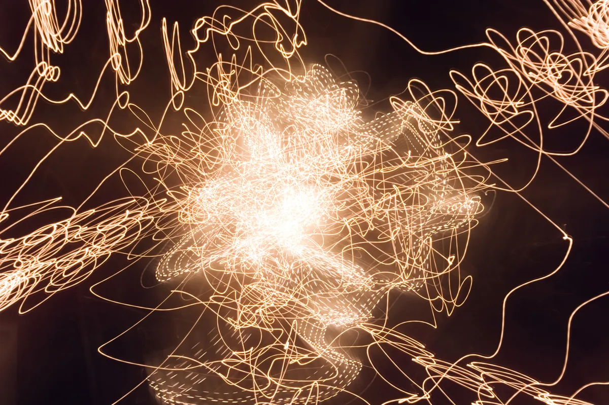 jordan-sampson-creative-ethos-of-the-beginning-enlarged- light painting photography - tungsten abstract - birthing of light source - white hole concept - creation origins