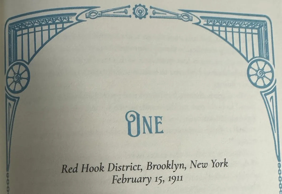A chapter plate with a turquoise art deco design that represents the wrought iron and glass enclosure the main character constructs. The chapter title reads "One: Red Hook District, Brooklyn, New York, February 15, 1911"