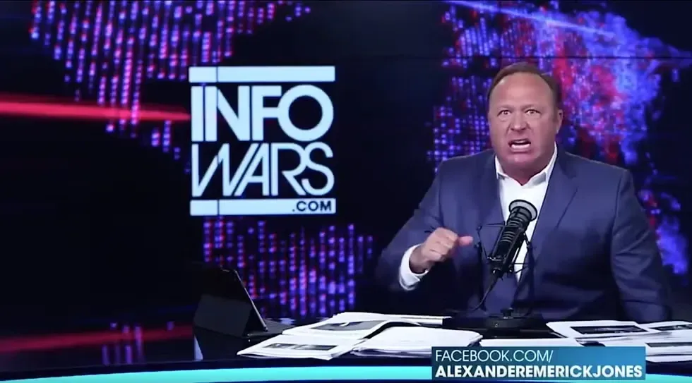 Alex Jones Infowars snarling at the TV camera