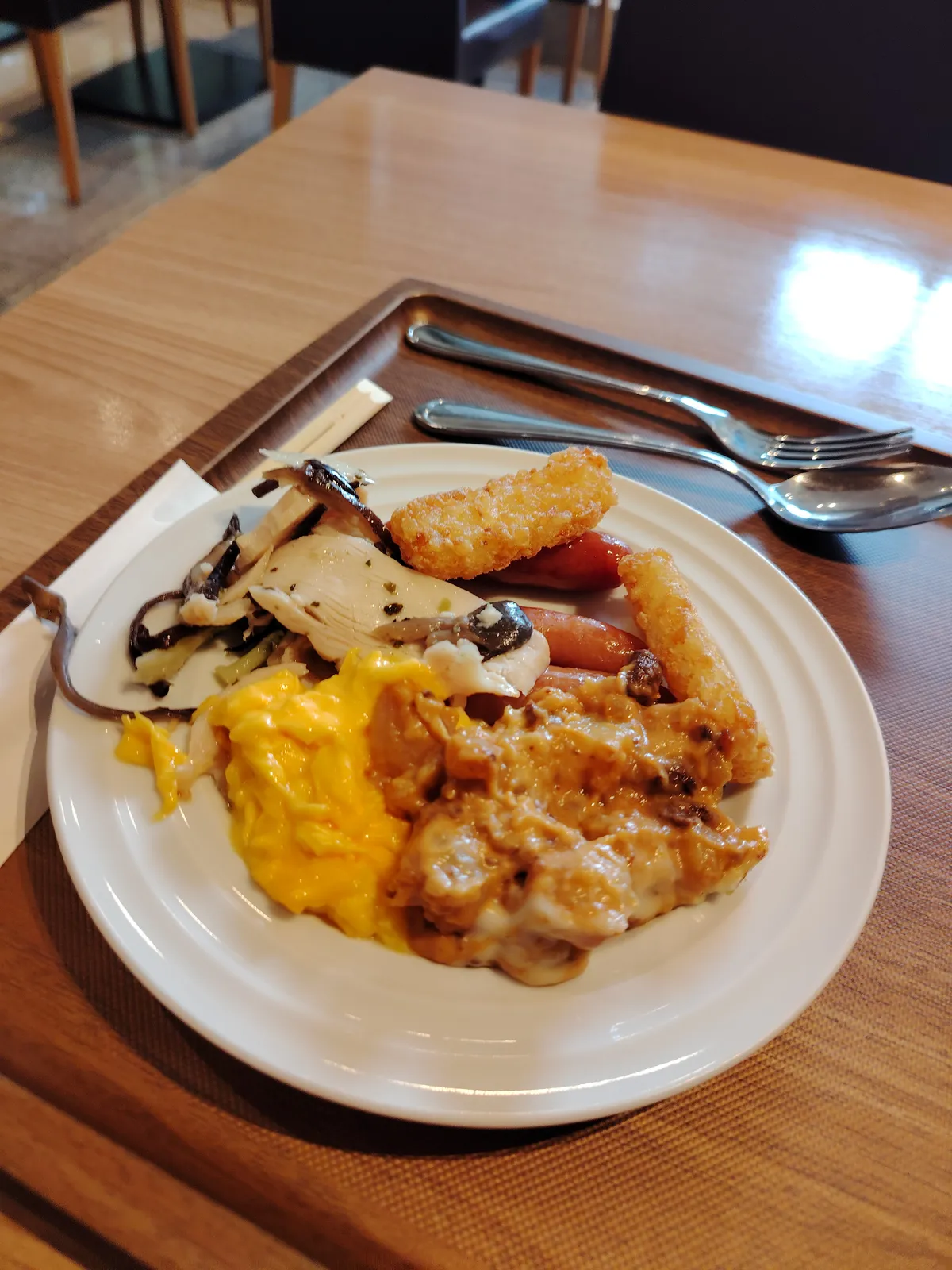 a western japanese breakfast with sausage links, some scrambled egg, some sort of potato crouton thing and two other foods I'm not exactly sure of what they are. Tasted good though.