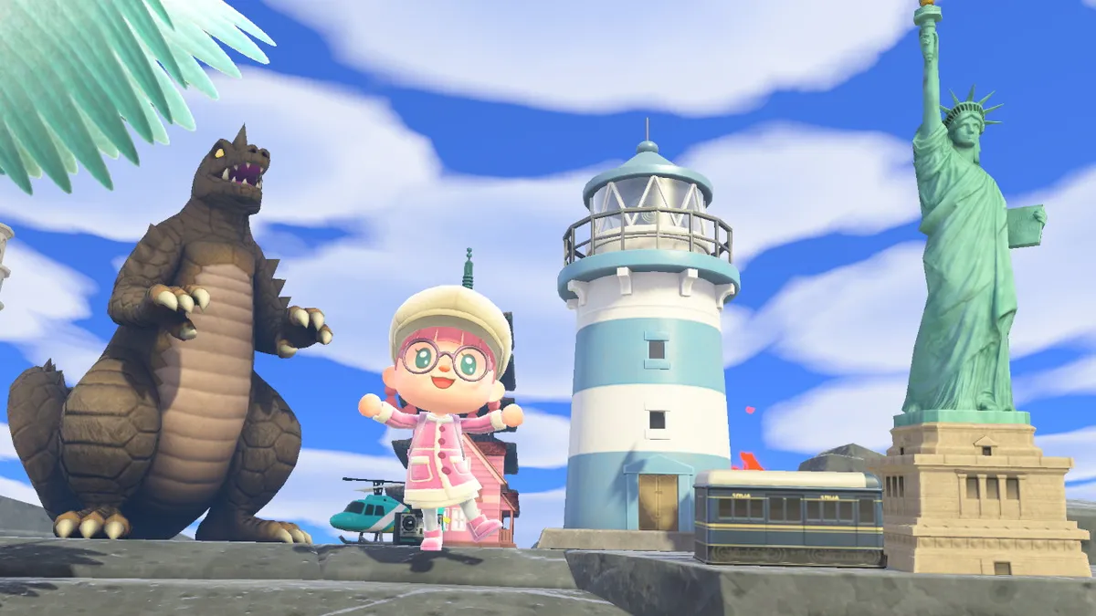 Slothra is standing in front of a large Godzilla figure, a toy helicopter, a lighthouse, the Statue of Liberty, and a trolley bus