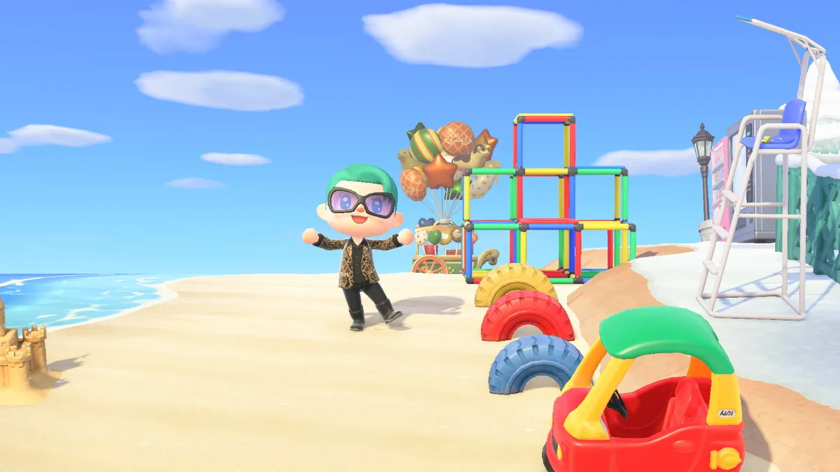 Slothra is standing next to a three large tyre seats, a jungle gym, and a kiddie car. There is also a lifeguard seat above all of these.