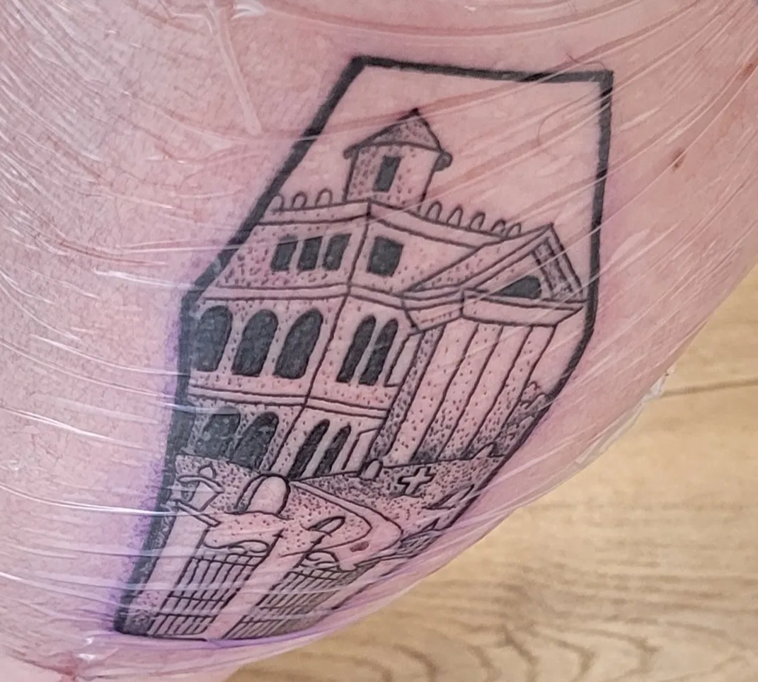 The same artwork, now with shading, tattooed on the back of a calf and wrapped in Second Skin and looking reddish and new.