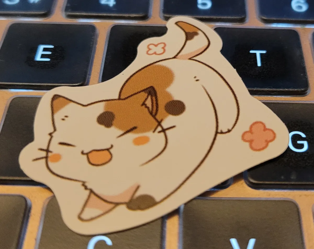A cartoony illustration of a calico cat with a wide open-mouth smile, closed eyes, and stretching out its front paws.