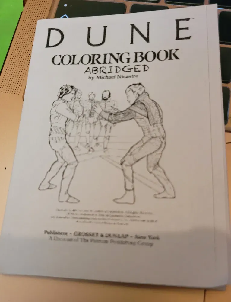 A small A6 sinze that has Paul fighting Feyd and it says above the illustration 