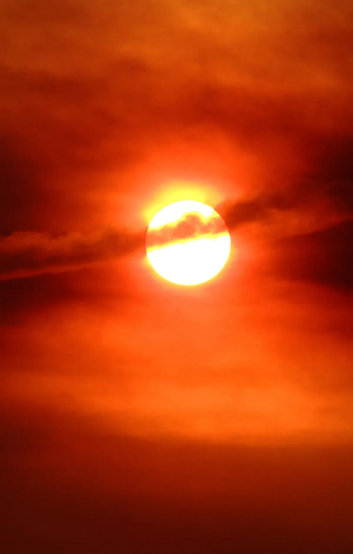 A dim and tarnished sun