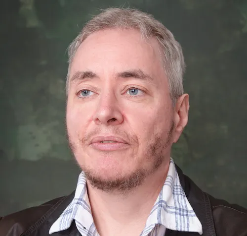 A photograph of Kell Shaw, looking nobly into the distance.