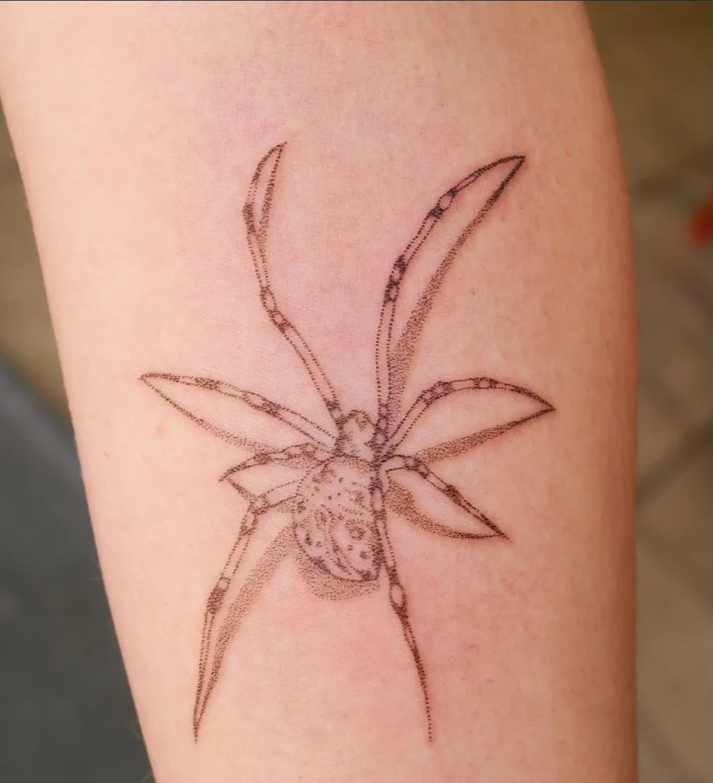Brown Widow spider tattoo