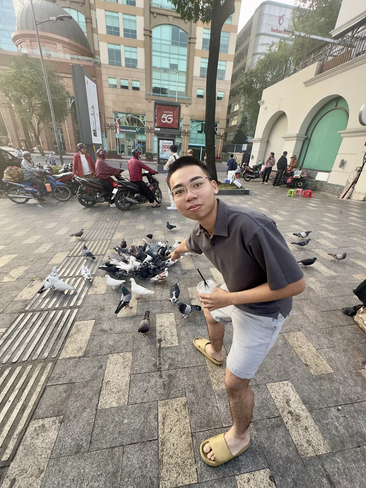 Me in front of a flock of pigeons