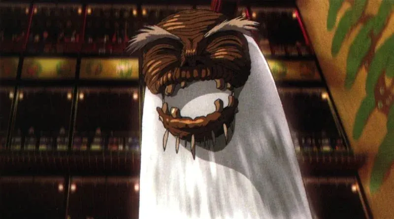 The Old River God from Spirited AWay, whose head also kind of looks like a walnut.