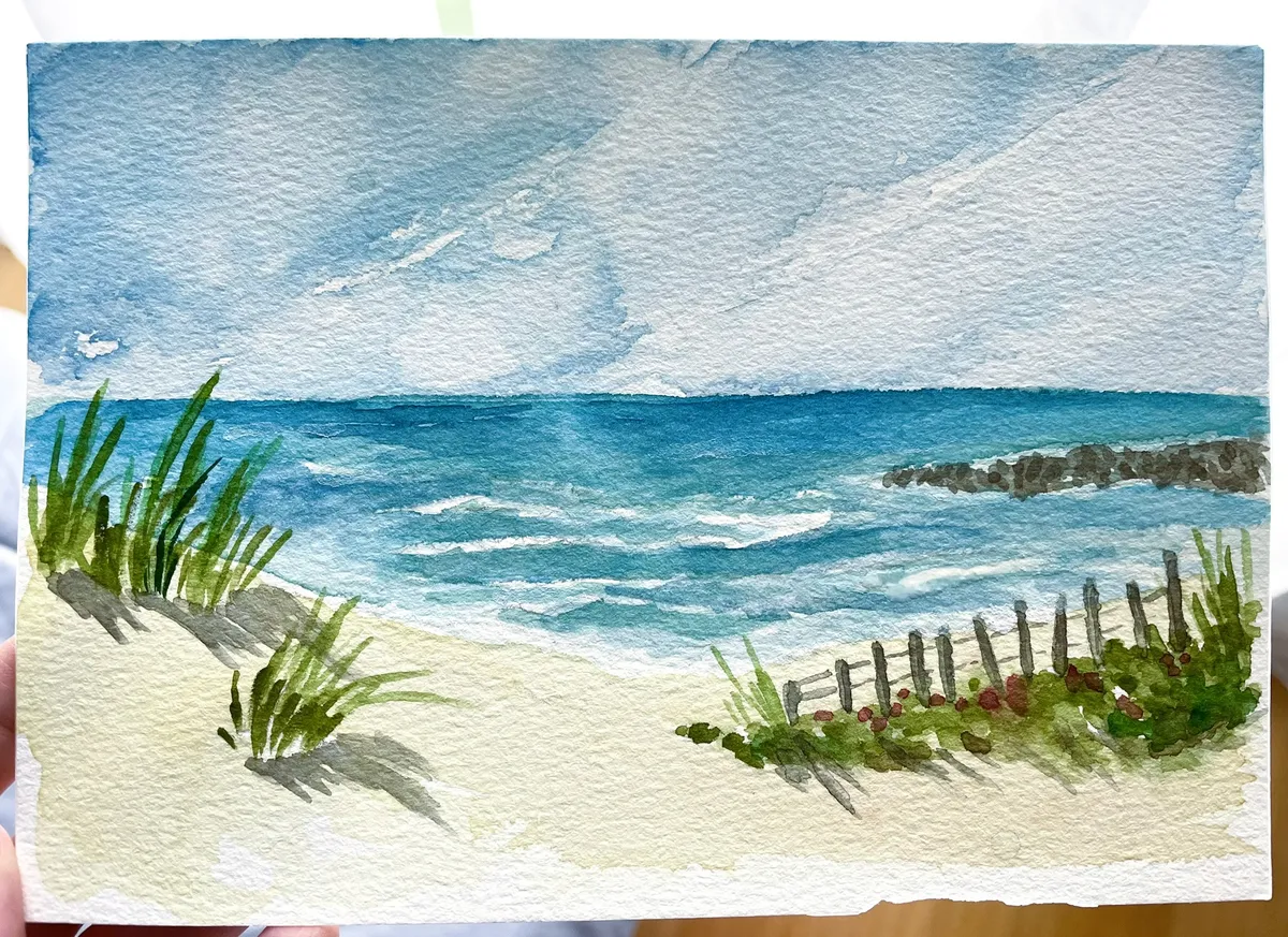 Watercolour painting of a beach