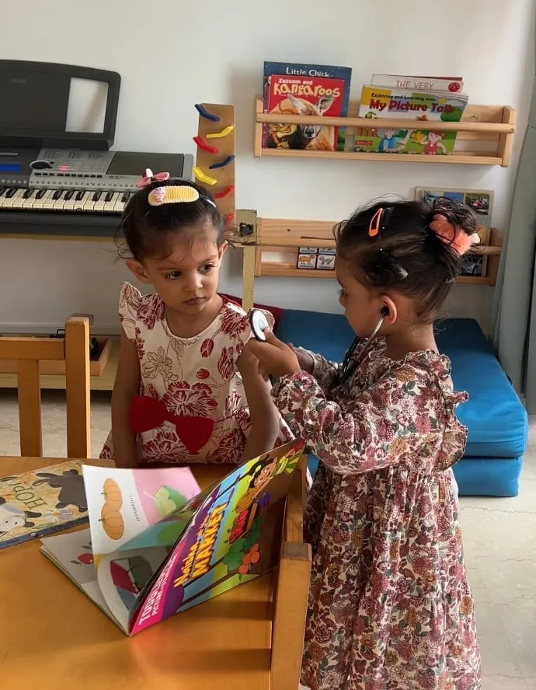 Dr Tashi (with stethoscope) and Tara in School