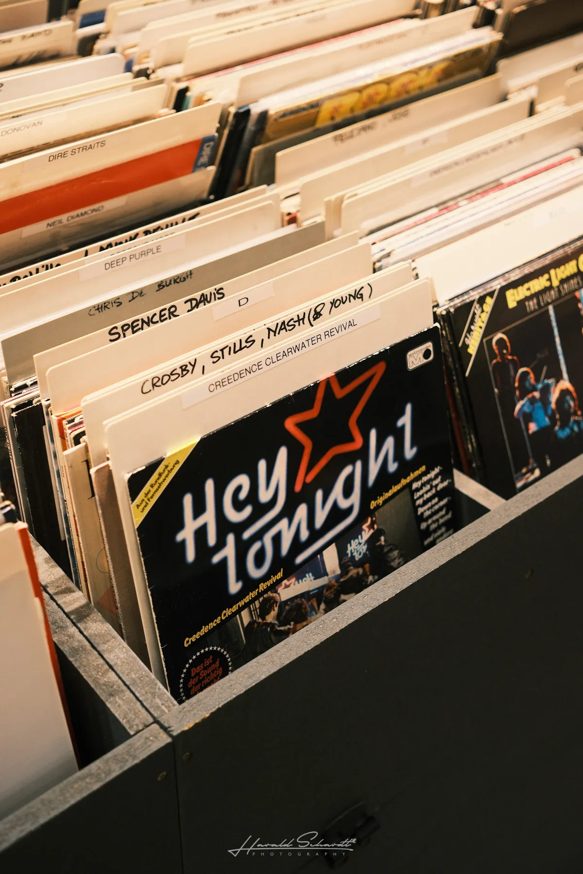Vinyl records in a crate, a Creedence Clearwater Revival