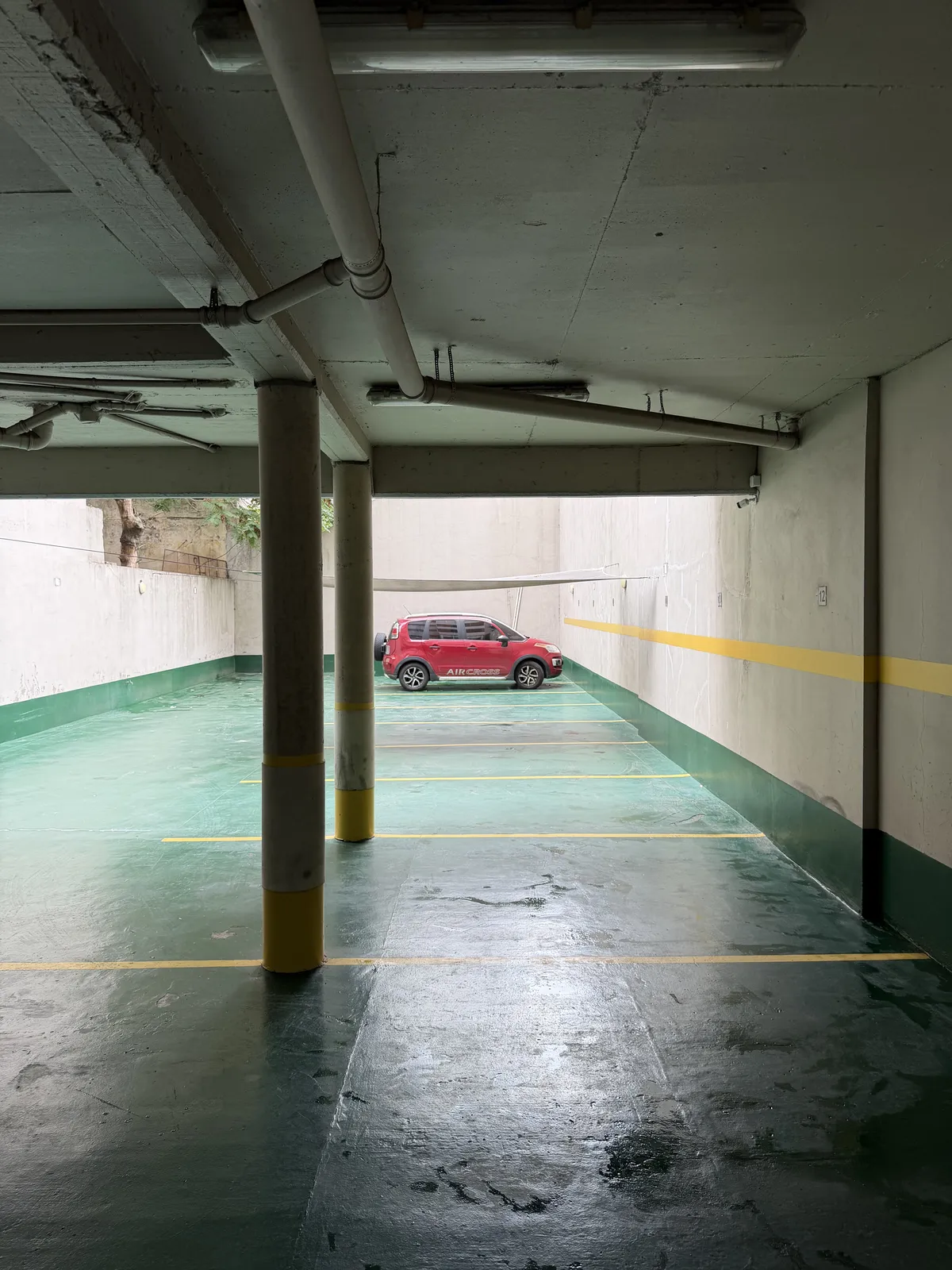 A red car in a garage