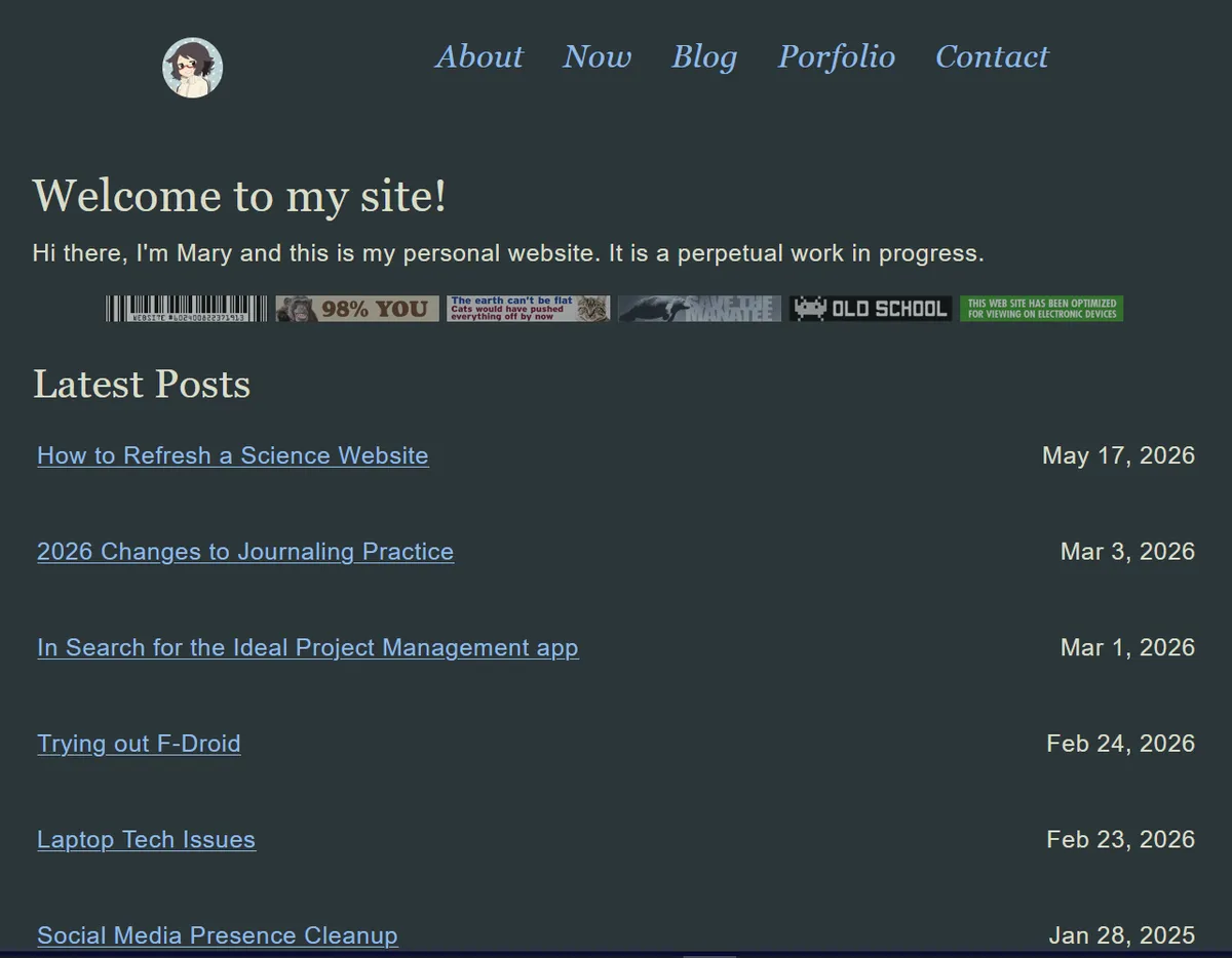 Snapshot of the previous version of my website as seen on a small screen. There's the main navigation at the top followed by a main column with some introductory words and stickers. Then, there's a list of latest blog posts. The color scheme is a similar dark blue with bright blue highlights. Simple and clutter-free.