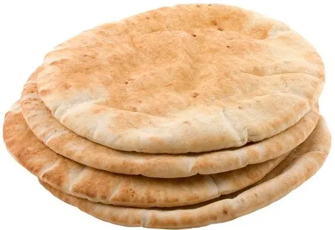 上图：皮塔饼（Pita）是以色列常见的有酵饼，主前2500年就出现于美索不达米亚。Pita饼只稍稍发酵，中间由蒸汽膨胀形成一个口袋，面饼冷却后变得平坦，里面有一个口袋。