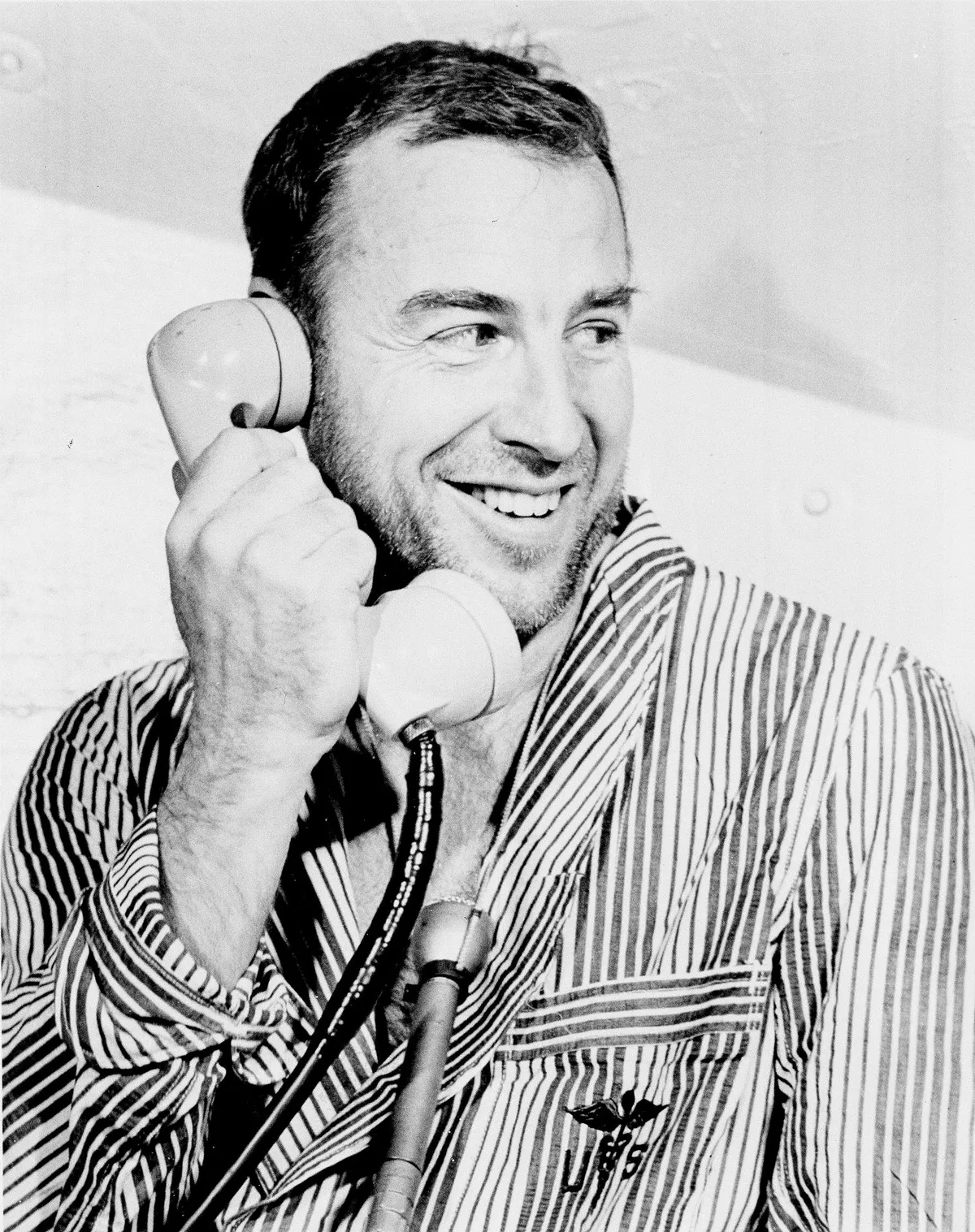 Apollo 8 Astronaut James Lovell, Command Module (CM) pilot of the first manned Saturn V space flight into Lunar orbit, accepted a phone call from the U.S. President Lyndon B. Johnson prior to launch.