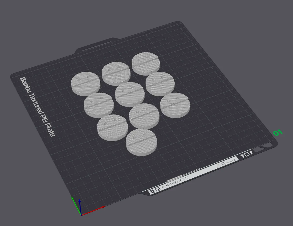 10 clips laid out flat on the print bed