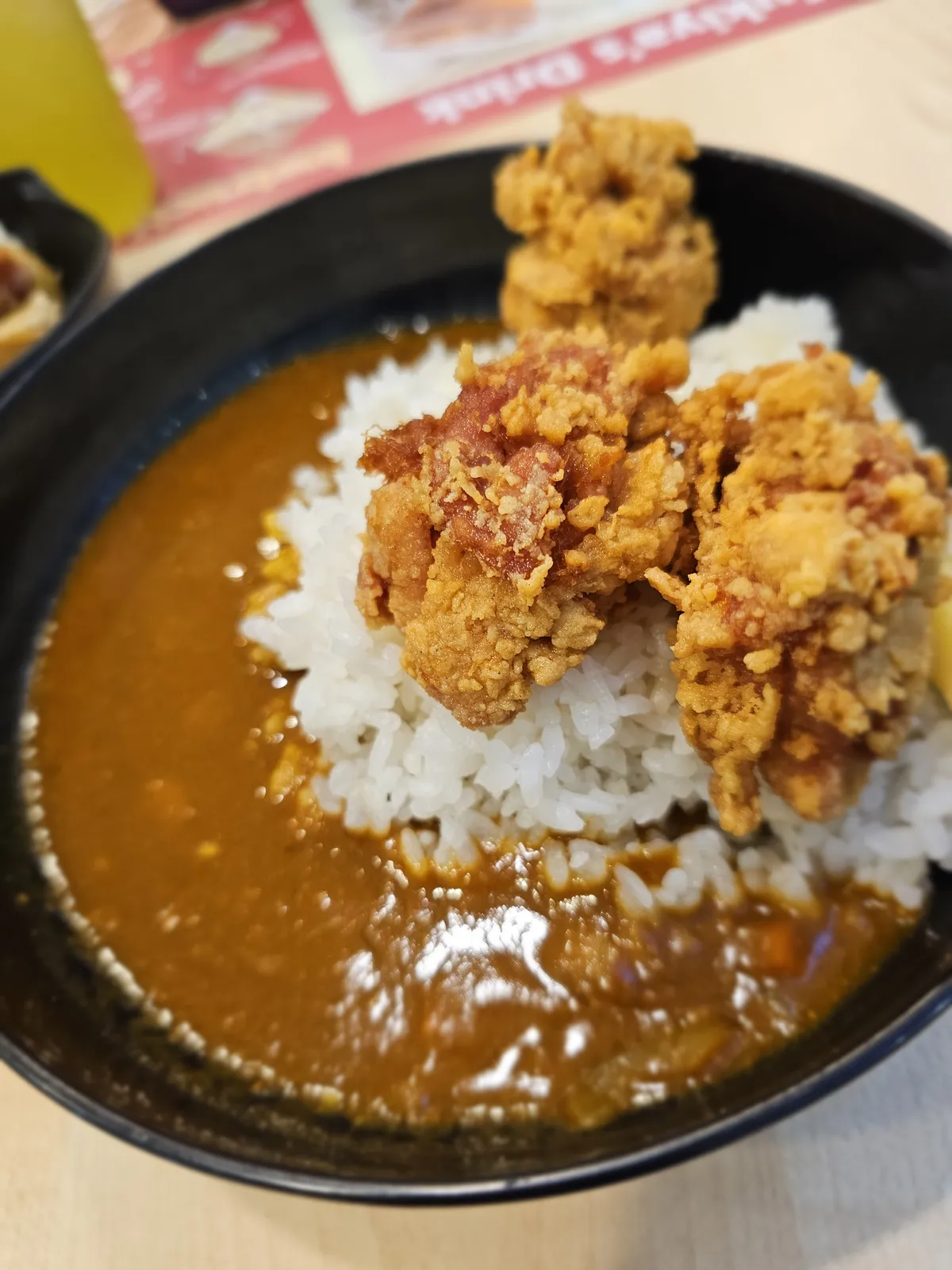 Karage chicken in Japanese curry with rice, 2025.
