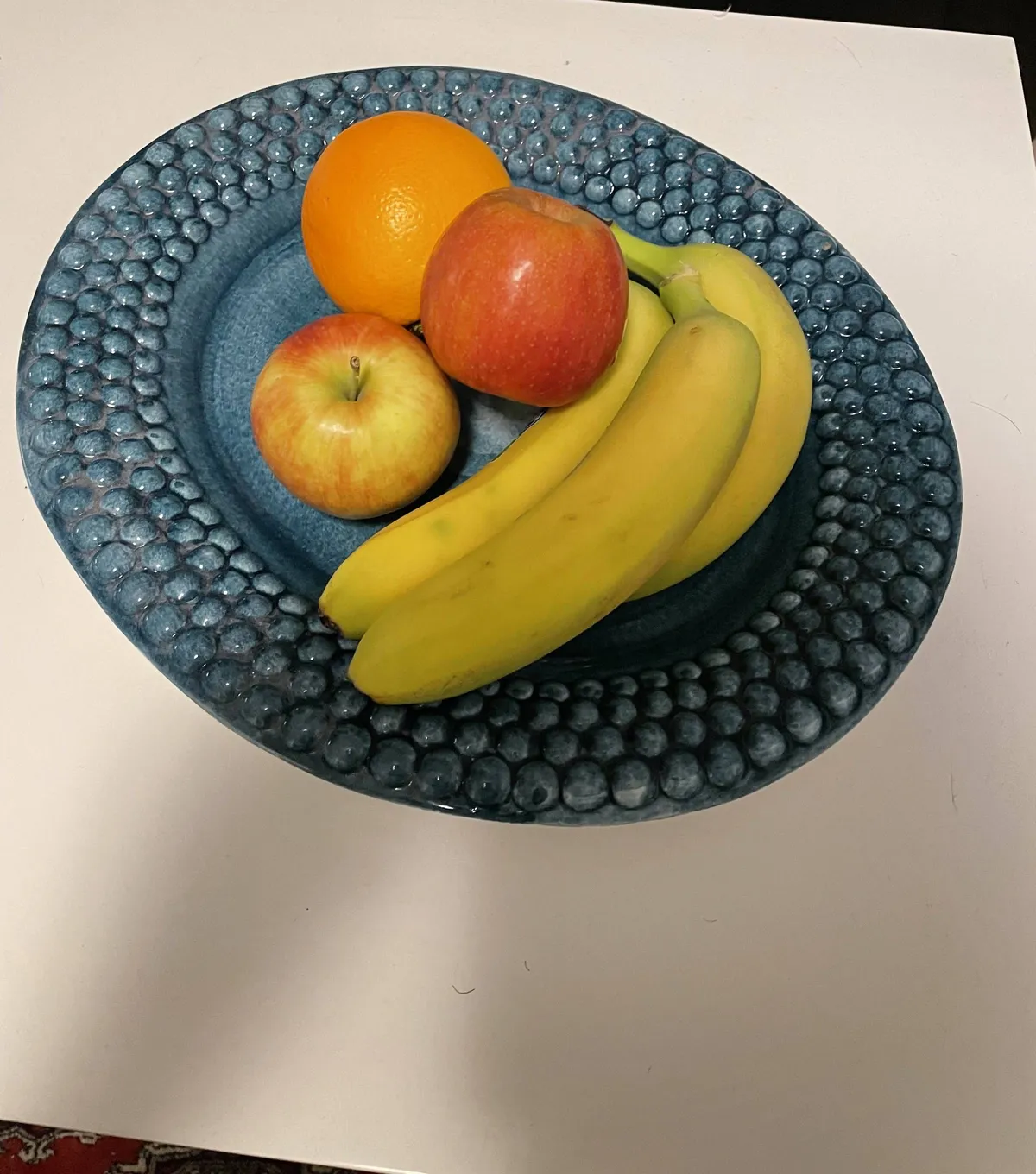 A full, colourful fruit bowl ready on the counter