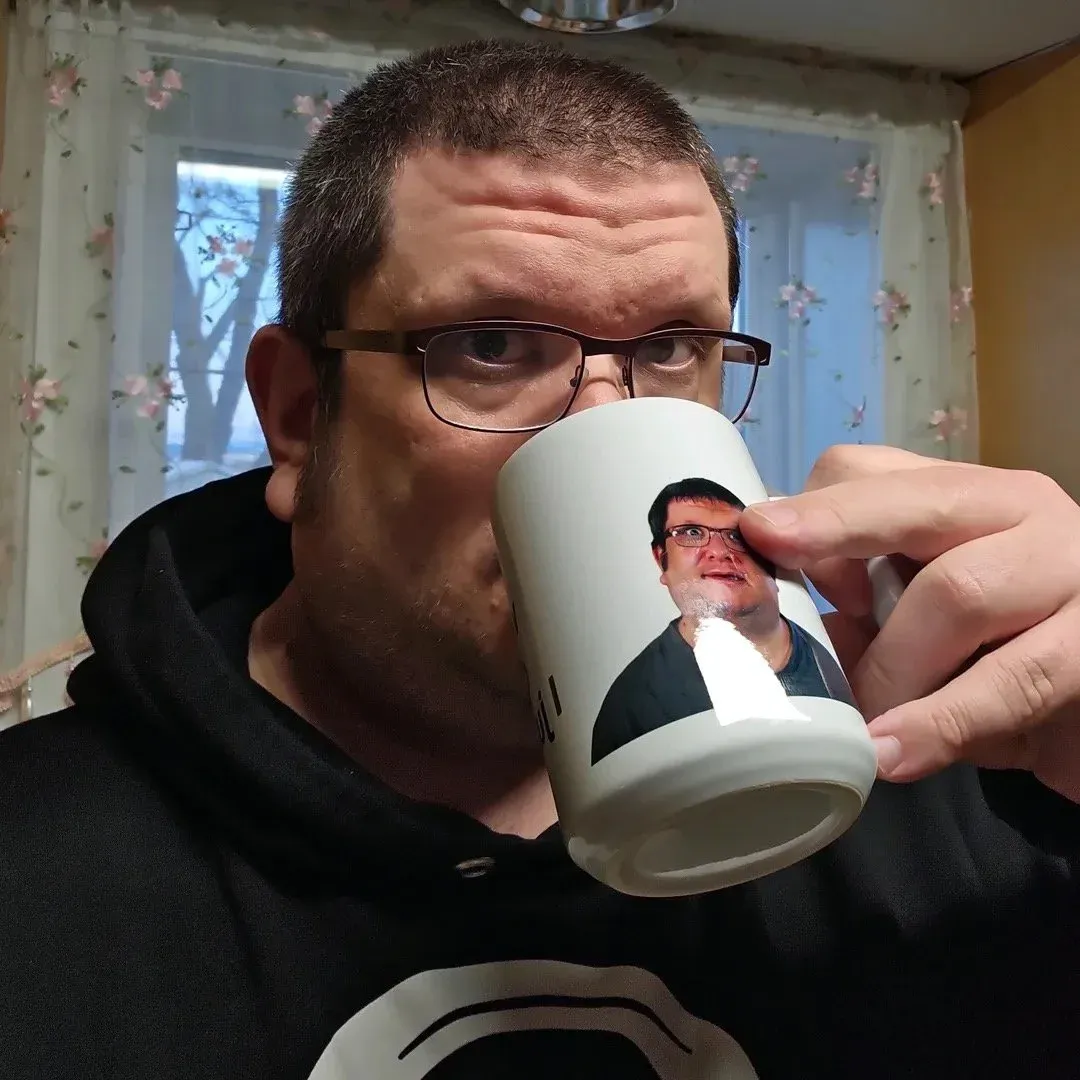 Ozject drinking from the OzMug