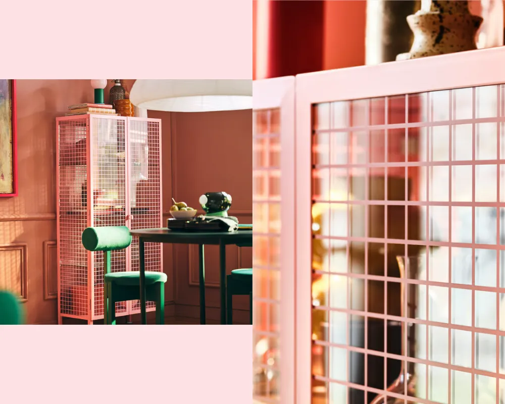 A glass cabinet with an all-over pale pink grid pattern, so it looks like wire mesh from afar.
