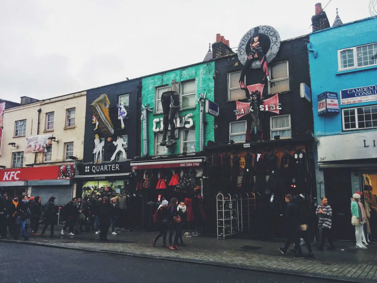 More shops with giant replicas of their wares installed on the face of the buildings.