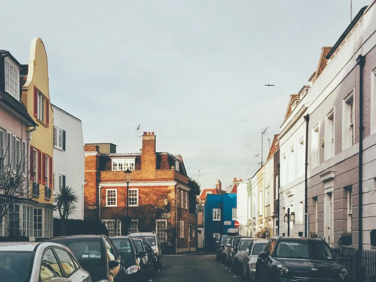 An intersection featuring various styles of buildings.
