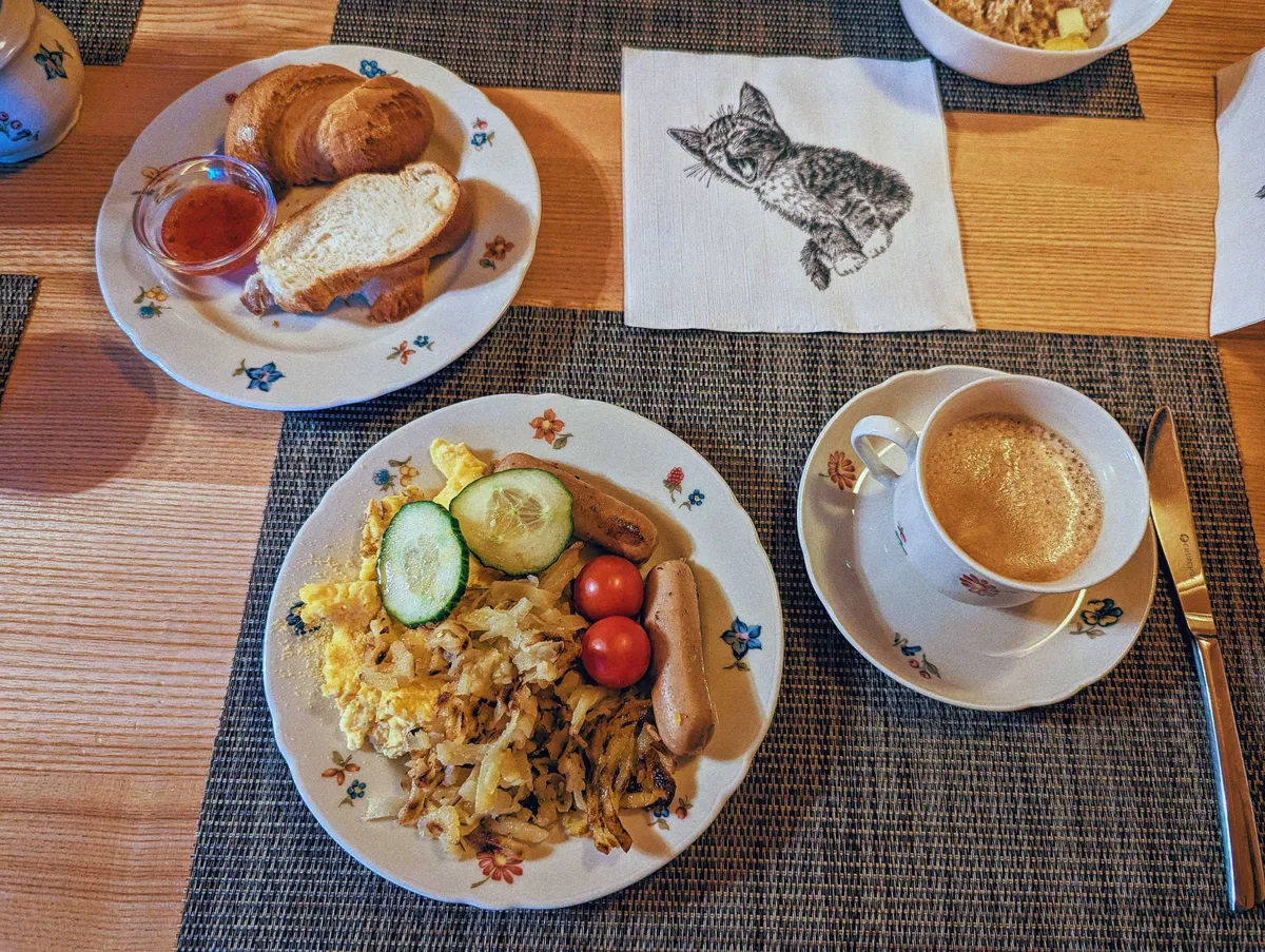 A table set with plates of food as described in the caption.