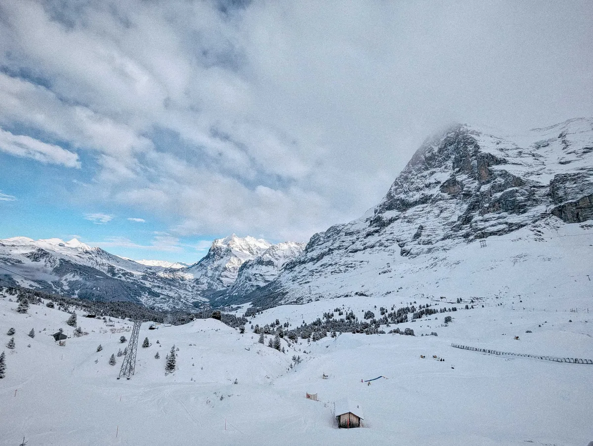 Snowy slopes surrounded by the Eiger mountains.