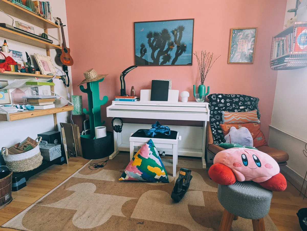 Floor is clear of clutter and Kirby is sitting on a stool.