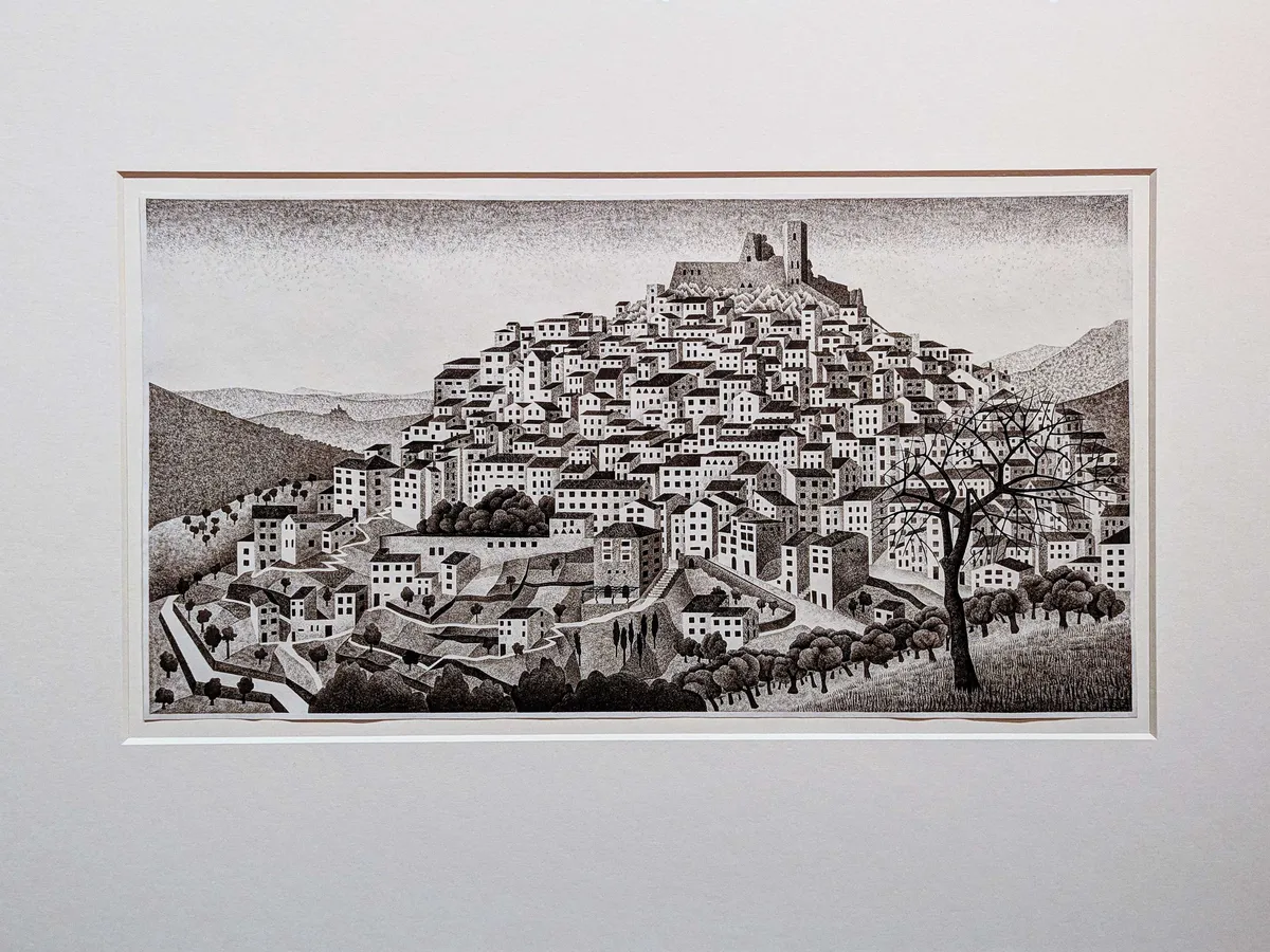 A print of a large city on a hill, done in a very simplistic and geometric style.