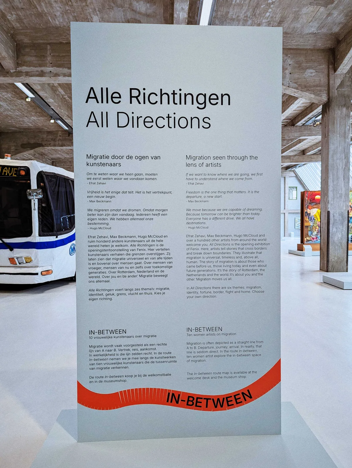 A standing banner explaining the exhibit in Dutch and English.
