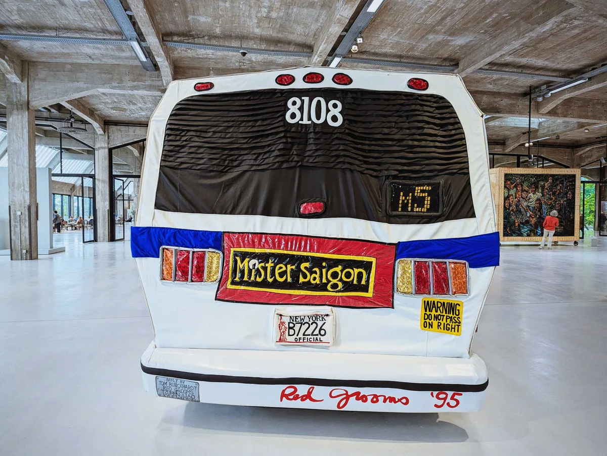 The back of the fabric commuter bus with the words, 