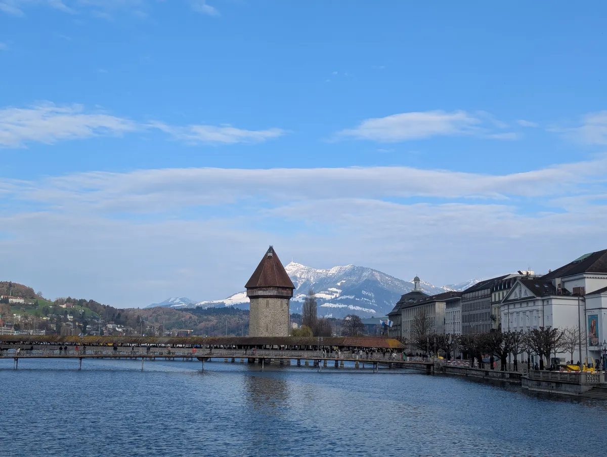 Video of Kappellbrucke with snowy mountains in the background.