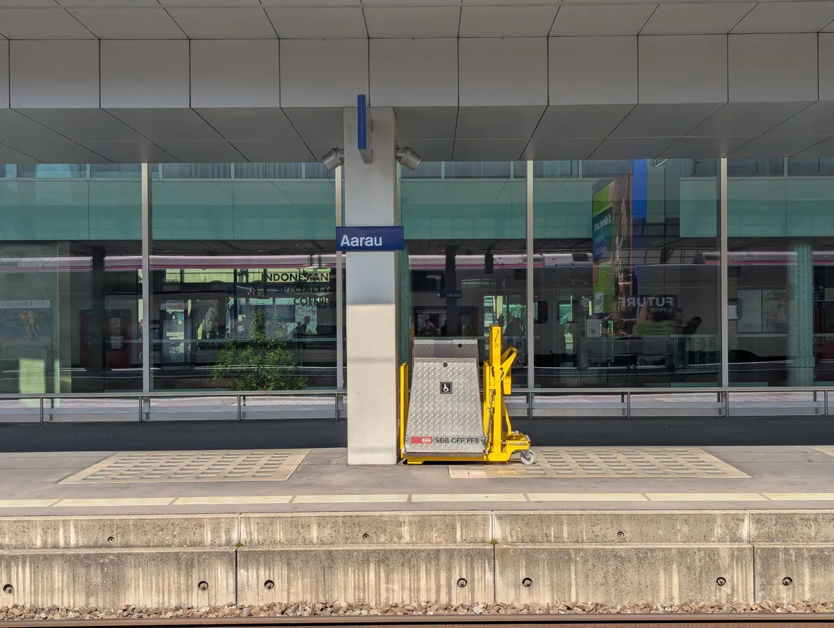 Train tracks with the sign Aarau.