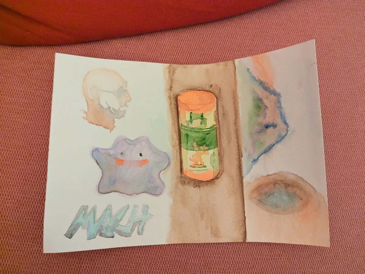 Water color paper with random doodles in watercolor.