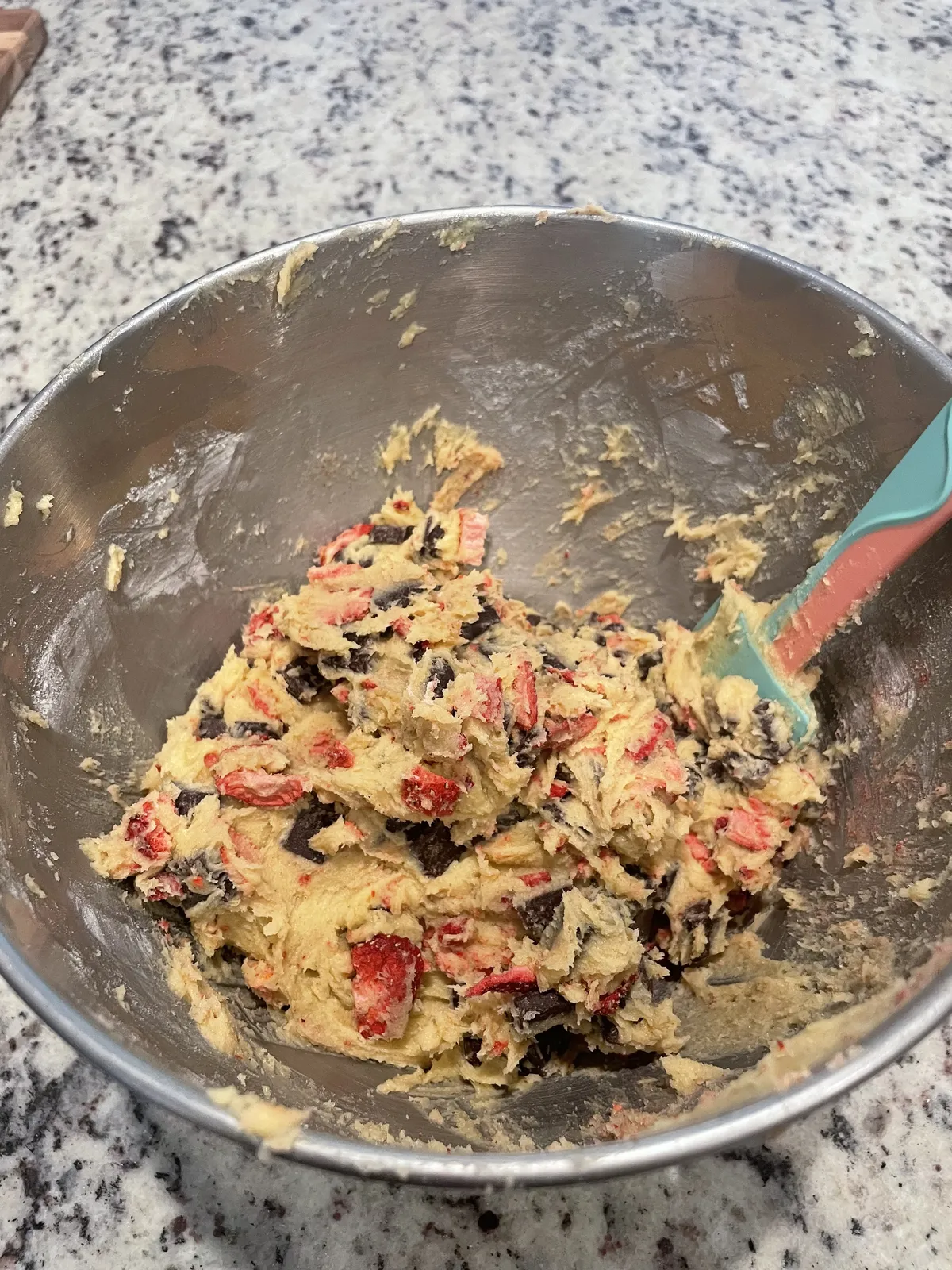 Cookie dough with freeze-dried strawberries and chocolate chunks mixed in