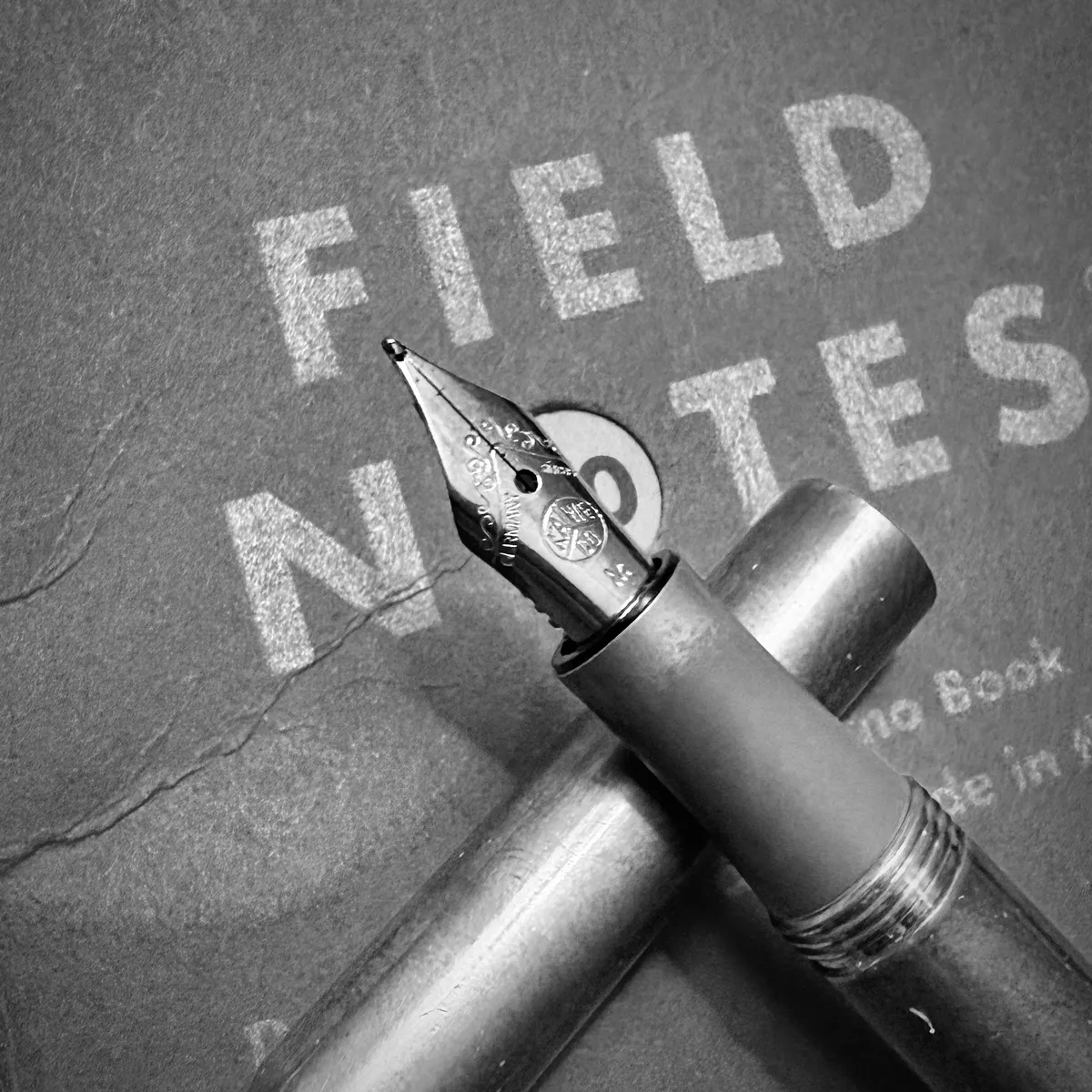a pen on a notebook